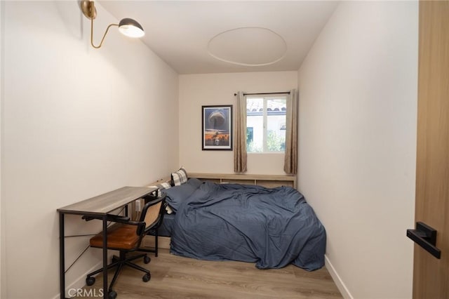 3233 Tareco Dr, Los Angeles, CA 90068 - bedroom with wood finished floors and baseboards