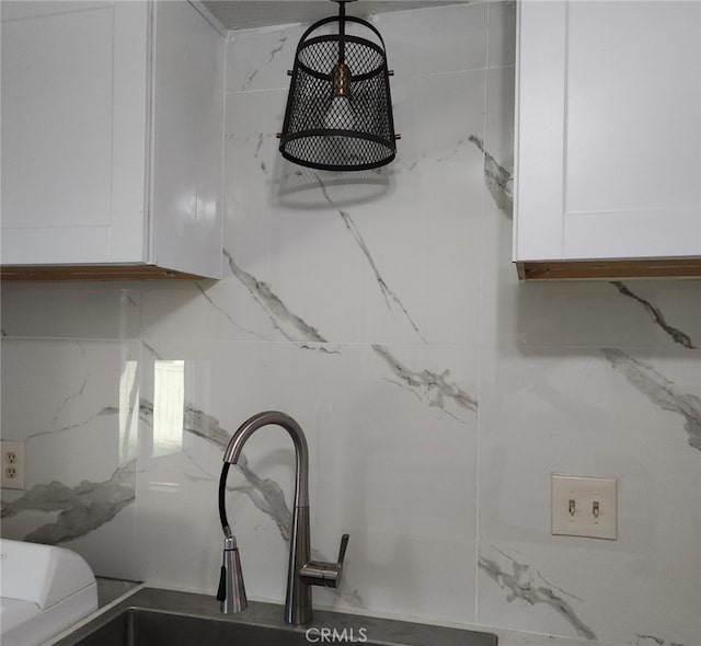 9240 Date St Unit 10A, Fontana, CA 92335 - kitchen view of white cabinets and a sink
