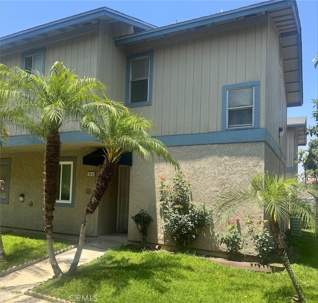 9240 Date St Unit 10A, Fontana, CA 92335 - view of front facade featuring a front yard