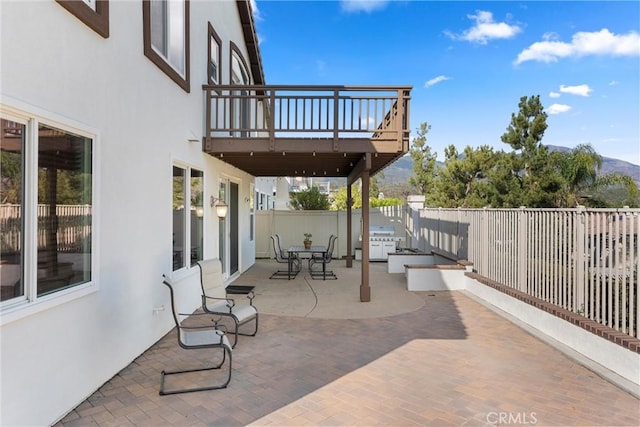 36 Via Tronido, Rancho Santa Margarita, CA 92688 - view of patio with a deck, outdoor dining space, and grilling area