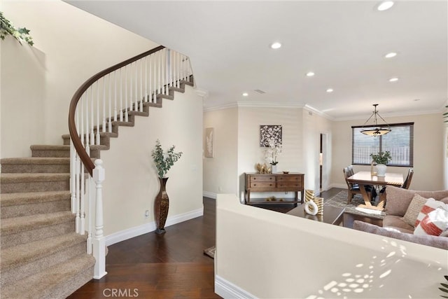 36 Via Tronido, Rancho Santa Margarita, CA 92688 - living area with stairway, recessed lighting, wood finished floors, ornamental molding, and a chandelier