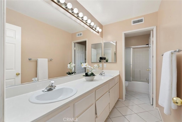 36 Via Tronido, Rancho Santa Margarita, CA 92688 - bathroom featuring double vanity, tile patterned floors, and shower / bath combination with glass door