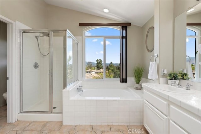 36 Via Tronido, Rancho Santa Margarita, CA 92688 - full bath with vaulted ceiling, a bath, vanity, a stall shower, and tile patterned flooring