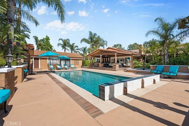 10920 Beechwood Dr, Rancho Cucamonga, CA 91737 - swimming pool with a patio area, an outdoor structure, and a storage structure