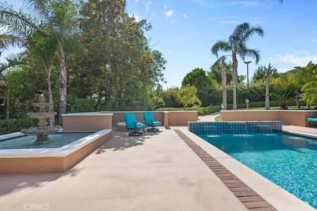 10920 Beechwood Dr, Rancho Cucamonga, CA 91737 - swimming pool with a patio