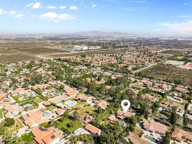 10920 Beechwood Dr, Rancho Cucamonga, CA 91737 - aerial view of property's location with a mountain backdrop and nearby suburban area