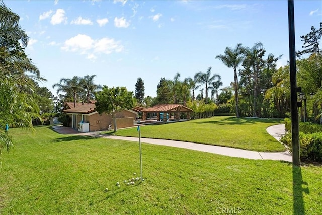 10920 Beechwood Dr, Rancho Cucamonga, CA 91737 - view of community featuring a gazebo, a lawn, and a garage