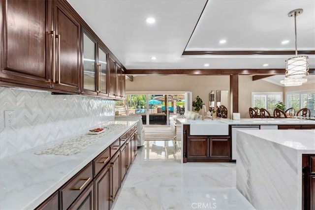 10920 Beechwood Dr, Rancho Cucamonga, CA 91737 - kitchen featuring decorative backsplash, recessed lighting, light marble finish flooring, hanging light fixtures, and dark brown cabinetry
