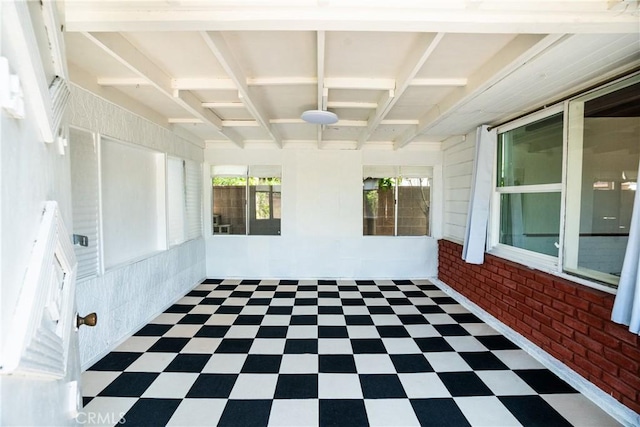 18126 S Denker Ave, Gardena, CA 90248 - unfurnished room featuring tile patterned floors and brick wall