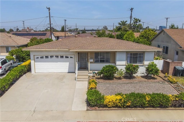 18126 S Denker Ave, Gardena, CA 90248 - ranch-style house with an attached garage, stucco siding, driveway, and a shingled roof