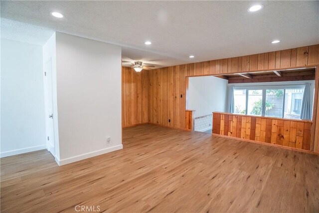 18126 S Denker Ave, Gardena, CA 90248 - spare room featuring wood finished floors, recessed lighting, wooden walls, and ceiling fan