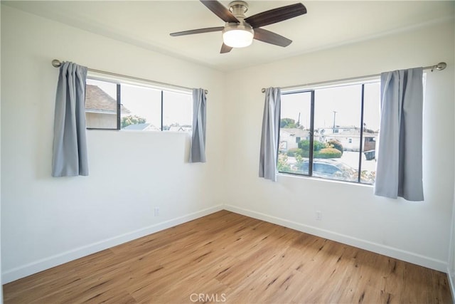 18126 S Denker Ave, Gardena, CA 90248 - unfurnished room with light wood-type flooring, healthy amount of natural light, and a ceiling fan