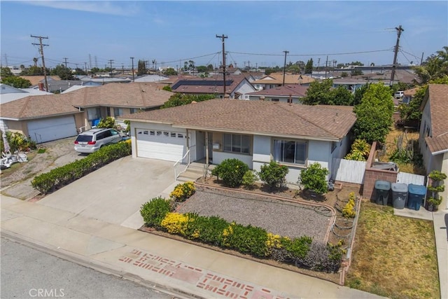 18126 S Denker Ave, Gardena, CA 90248 - ranch-style home with a garage, concrete driveway, a residential view, and stucco siding