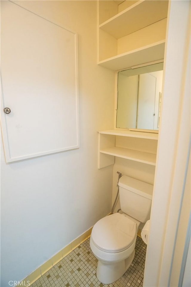 18126 S Denker Ave, Gardena, CA 90248 - half bath featuring toilet and baseboards