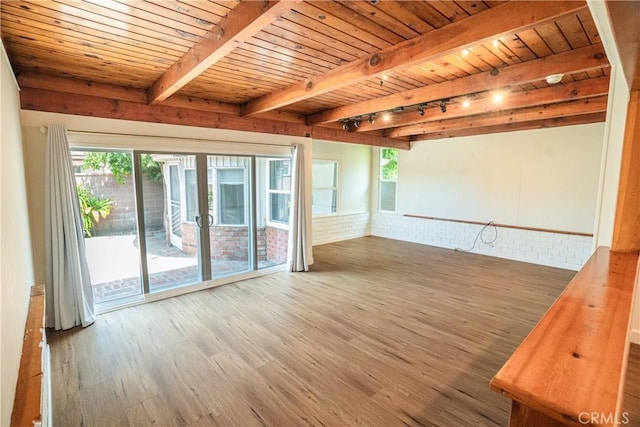 18126 S Denker Ave, Gardena, CA 90248 - empty room featuring a wood ceiling with exposed beams, wood finished floors, healthy amount of natural light, and rail lighting