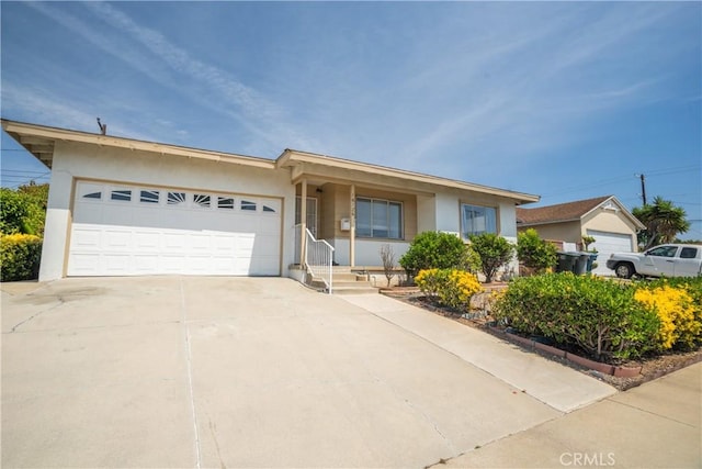 18126 S Denker Ave, Gardena, CA 90248 - ranch-style house featuring stucco siding, an attached garage, and concrete driveway