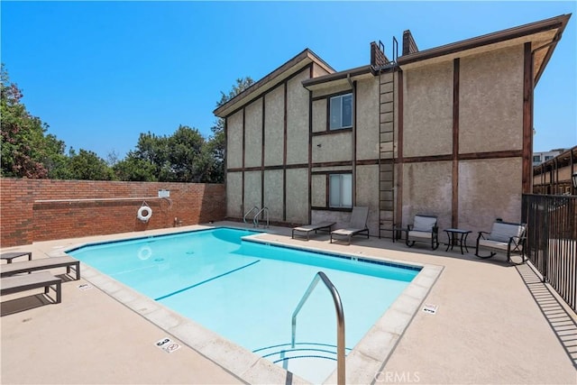 5500 Lindley Ave Unit 206, Encino, CA 91316 - community pool featuring a fenced backyard and a patio