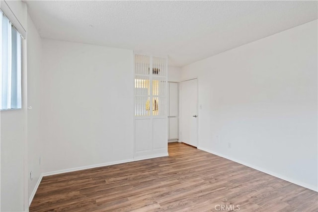 5500 Lindley Ave Unit 206, Encino, CA 91316 - empty room with wood finished floors