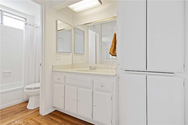5500 Lindley Ave Unit 206, Encino, CA 91316 - full bath with vanity, wood finished floors, and shower / bathtub combination with curtain