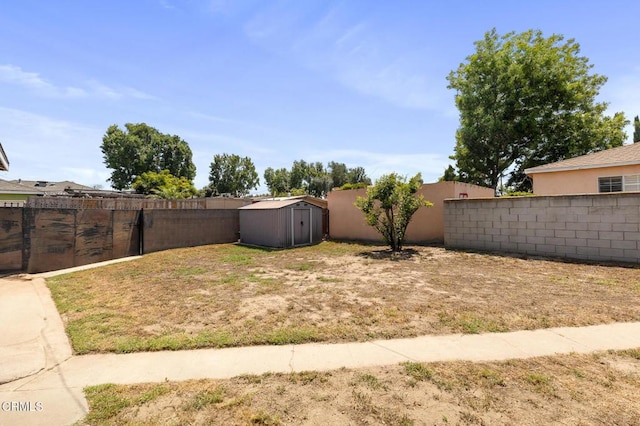 272 E 69th St, Long Beach, CA 90805 - fenced backyard featuring a shed