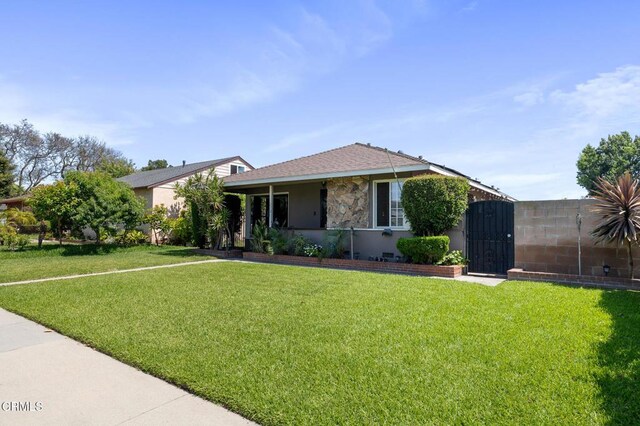 272 E 69th St, Long Beach, CA 90805 - view of front of house with stone siding