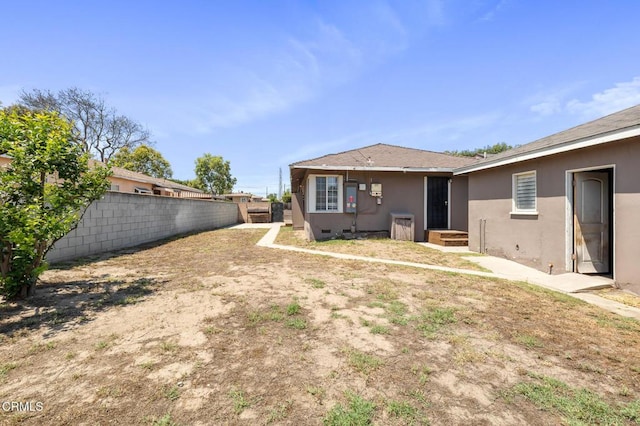 272 E 69th St, Long Beach, CA 90805 - back of property featuring stucco siding