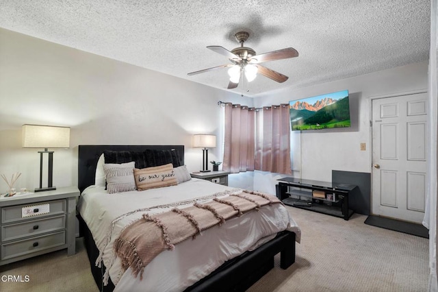 272 E 69th St, Long Beach, CA 90805 - bedroom featuring carpet floors, a textured ceiling, and ceiling fan