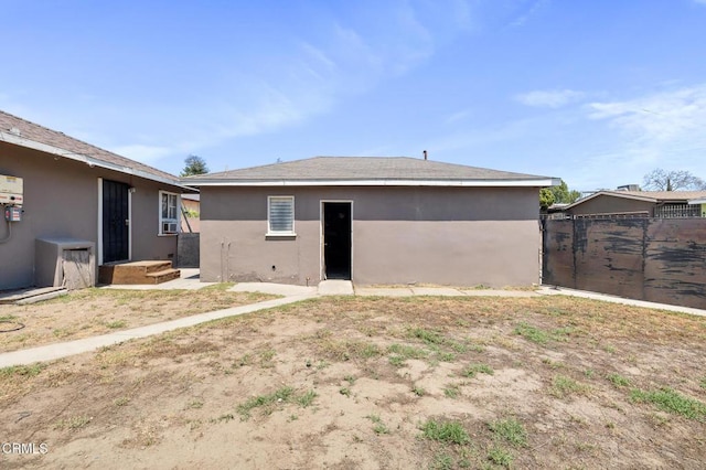 272 E 69th St, Long Beach, CA 90805 - rear view of house featuring stucco siding