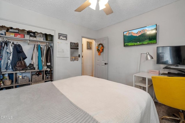 272 E 69th St, Long Beach, CA 90805 - bedroom with a closet, a textured ceiling, and ceiling fan