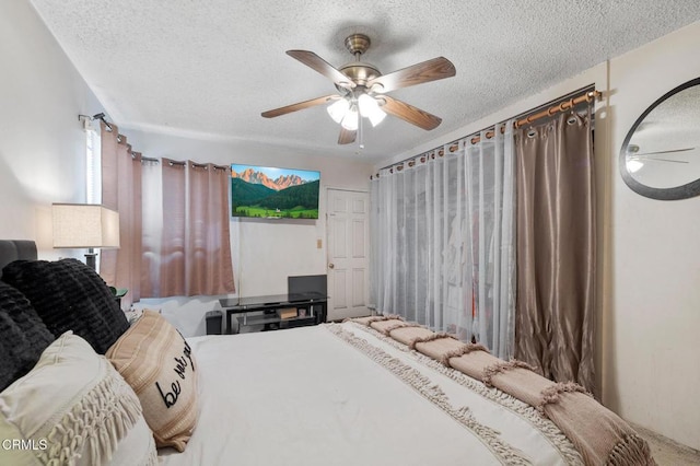 272 E 69th St, Long Beach, CA 90805 - bedroom with a textured ceiling and ceiling fan