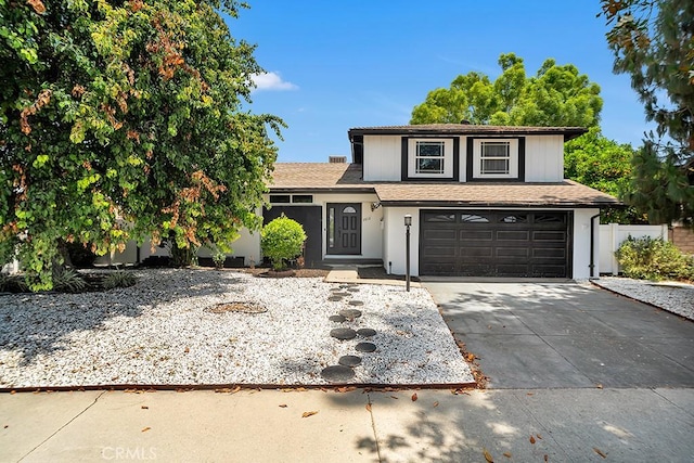 7812 Fairchild Ave, Winnetka, CA 91306 - traditional-style house with concrete driveway, a garage, and stucco siding