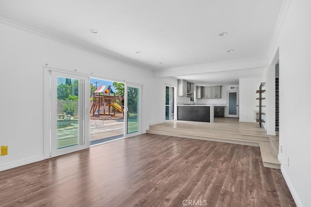 7812 Fairchild Ave, Winnetka, CA 91306 - unfurnished living room featuring crown molding, wood finished floors, and recessed lighting
