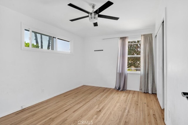 7812 Fairchild Ave, Winnetka, CA 91306 - empty room with healthy amount of natural light, wood finished floors, and ceiling fan