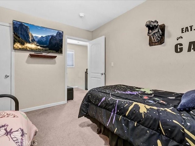 10316 S San Pedro St, Los Angeles, CA 90003 - carpeted bedroom featuring baseboards