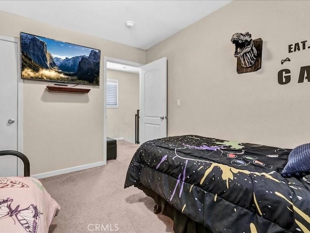 10316 S San Pedro St, Los Angeles, CA 90003 - bedroom featuring carpet floors and baseboards