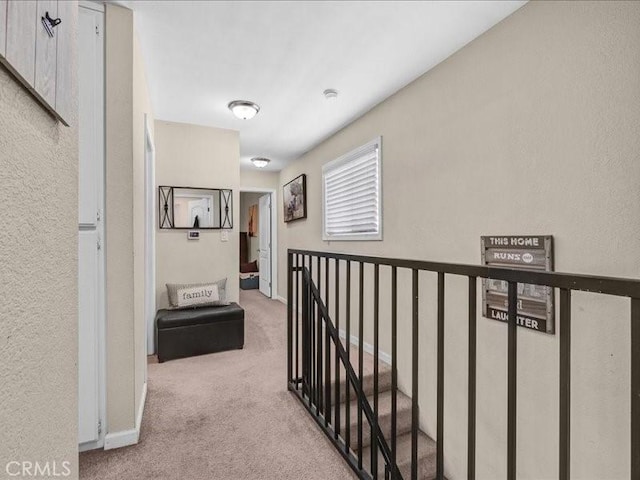 10316 S San Pedro St, Los Angeles, CA 90003 - hallway with carpet flooring and an upstairs landing