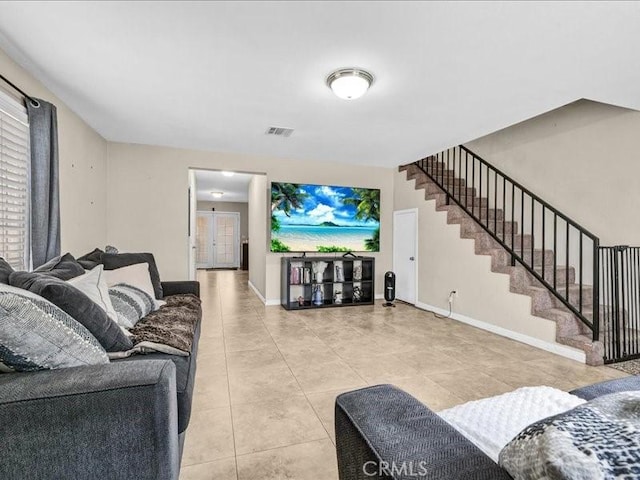 10316 S San Pedro St, Los Angeles, CA 90003 - living area with light tile patterned flooring and stairs