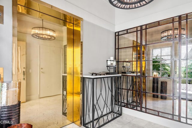 1758 Emerald Isle Way, Oxnard, CA 93035 - corridor with a chandelier and an upstairs landing