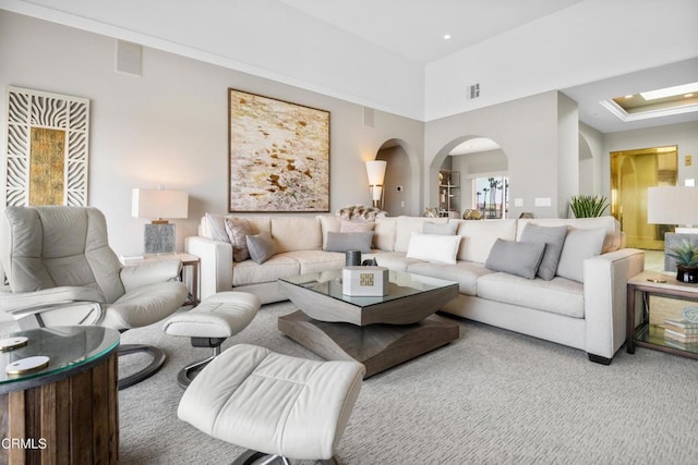 1758 Emerald Isle Way, Oxnard, CA 93035 - living room featuring arched walkways, carpet floors, and recessed lighting