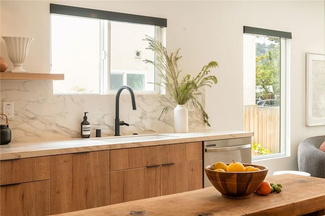 2404 Glover Pl, Los Angeles, CA 90031 - kitchen with backsplash, light countertops, plenty of natural light, and dishwasher