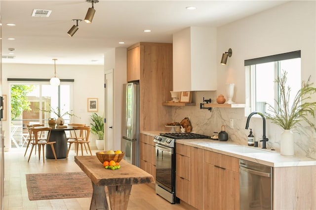 2404 Glover Pl, Los Angeles, CA 90031 - kitchen with stainless steel appliances, modern cabinets, tasteful backsplash, recessed lighting, and pendant lighting