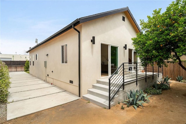 2404 Glover Pl, Los Angeles, CA 90031 - view of side of home with crawl space and stucco siding