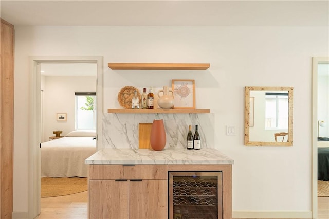 2404 Glover Pl, Los Angeles, CA 90031 - bar with beverage cooler, light wood-type flooring, and tasteful backsplash