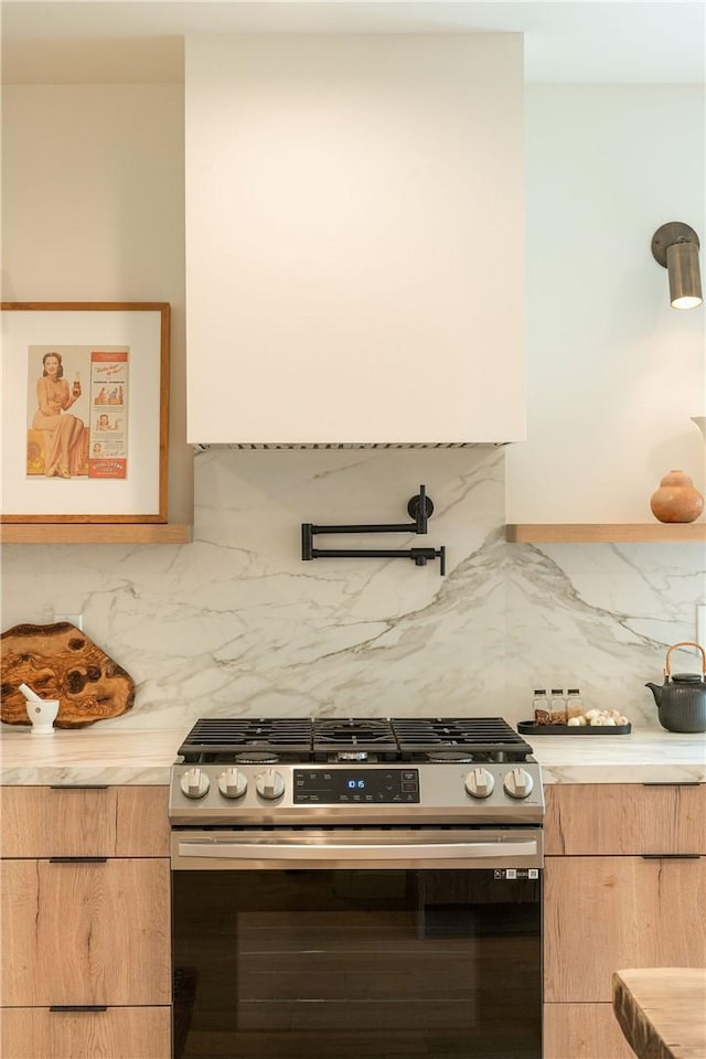2404 Glover Pl, Los Angeles, CA 90031 - kitchen with stainless steel range with gas cooktop, light countertops, decorative backsplash, modern cabinets, and light brown cabinetry