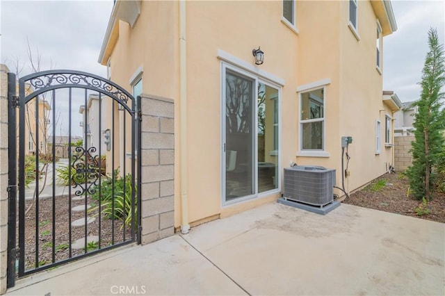 11237 Gladhill Rd Unit 12, Whittier, CA 90604 - property entrance featuring stucco siding, a gate, and a patio area