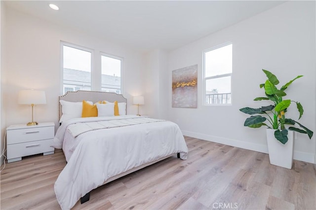 11237 Gladhill Rd Unit 12, Whittier, CA 90604 - bedroom featuring light wood-style flooring and recessed lighting