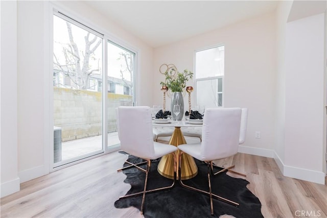 11237 Gladhill Rd Unit 12, Whittier, CA 90604 - dining space featuring wood finished floors and baseboards