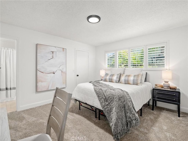 1263 Bundy Ave, Clovis, CA 93611 - carpeted bedroom with a textured ceiling