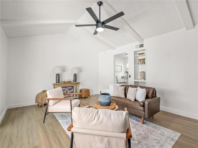 1263 Bundy Ave, Clovis, CA 93611 - living area with a ceiling fan, light wood-type flooring, and a textured ceiling