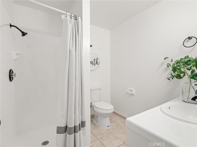 1263 Bundy Ave, Clovis, CA 93611 - full bath with curtained shower, tile patterned floors, and vanity